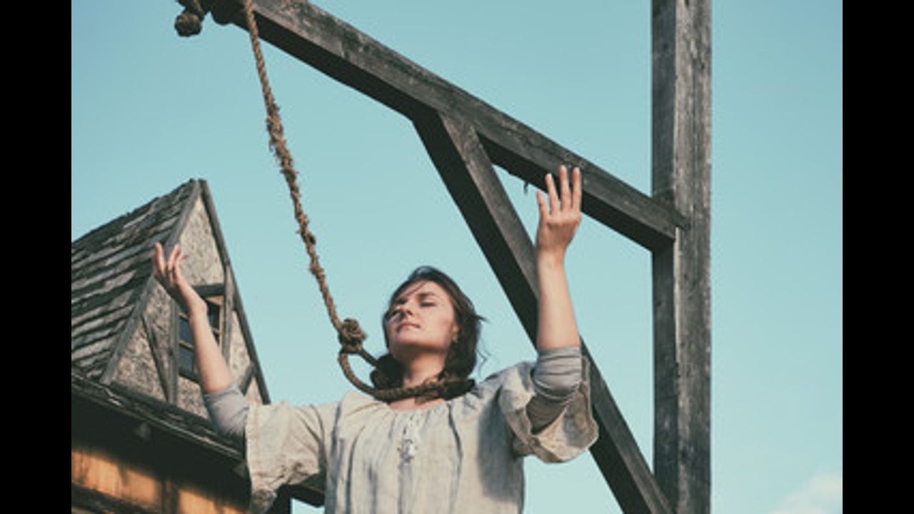A woman hanging on a gibbet